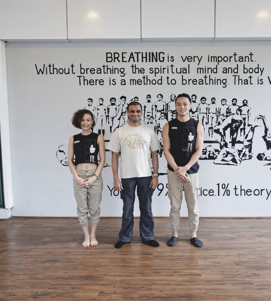 Jamsai, R. Sharath Jois and Boonchu at the AYBKK shala wall
